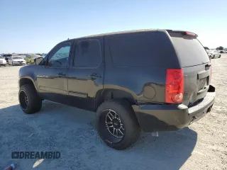 2013 GMC Yukon SLT with VIN 1GKS2CE03DR258564, listed as a Copart auction lot 61439774 with 147,284 mi miles and Salvage Title. Bid and sale history available at carsss.com. Image 2.