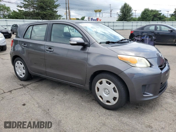 2011 Scion xD with VIN JTKKU4B41B1014726, listed as a Copart auction lot 65149405 with 210,102 mi miles and Salvage title. Bid and sale history available at DreamBid. Image 4.