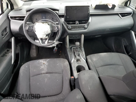 2023 Toyota Corolla Cross LE z VIN 7MUCAABG9PV044246, wystawiony jako Copart lot #51372405 z przebiegiem 63 743 mil mil oraz Szkoda całkowita • Salvage title. Historia ofert i sprzedaży dostępna na DreamBid. Obrazek 8.