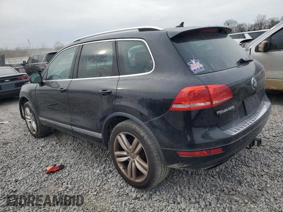 2013 Volkswagen Touareg Lux with VIN WVGEF9BP2DD006847, listed as a Copart auction lot 87613955 with 157,200 mi miles and Salvage Title. Bid and sale history available at DreamBid. Image 2.