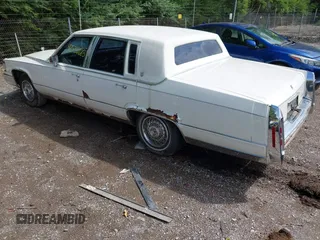 1991 Cadillac Brougham z VIN 1G6DW54E5MR723477, wystawiony jako IAAI lot #42535123 z przebiegiem 300 768 mil mil oraz . Historia ofert i sprzedaży dostępna na DreamBid. Obrazek 3.