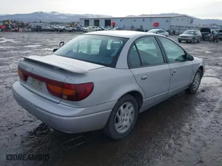 2000 Saturn SL with VIN 1G8ZJ527XYZ218993, listed as a IAAI auction lot 41603358 with 237,150 mi miles. Bid and sale history available at carsss.com. Image 4.