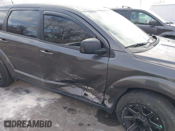 2014 Dodge Journey American Value Pkg with VIN 3C4PDCAB5ET235427, listed as a IAAI auction lot 41056216 with 164,740 mi miles. Bid and sale history available at carsss.com. Image 6.