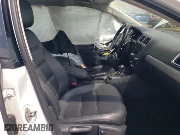 2014 Volkswagen Jetta Sedan SE w/Connectivity with VIN 3VWD07AJ0EM441517, listed as a Copart auction lot 65257454 with 132,987 mi miles and Salvage Title. Bid and sale history available at carsss.com. Image 7.