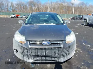 2013 Ford Focus SE with VIN 1FADP3F24DL288221, listed as a IAAI auction lot 41646815 with 169,617 mi miles. Bid and sale history available at carsss.com. Image 12.