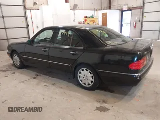 1998 Mercedes-Benz E-Class with VIN WDBJF65F7WA617755, listed as a IAAI auction lot 41737424 with 113,068 mi miles. Bid and sale history available at carsss.com. Image 3.