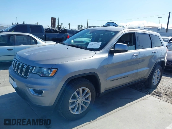 2021 Jeep Grand Cherokee Laredo E with VIN 1C4RJEAG6MC719089, listed as a IAAI auction lot 39290041 with 44,726 mi miles and . Bid and sale history available at DreamBid. Image 2.