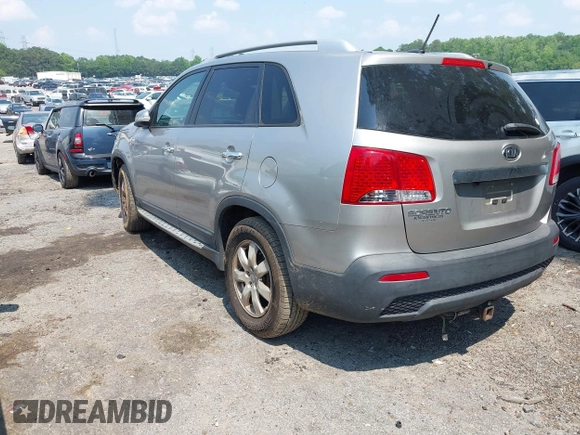 2013 Kia Sorento LX with VIN 5XYKT3A64DG357542, listed as a IAAI auction lot 42402188 with 171,648 mi miles and . Bid and sale history available at DreamBid. Image 3.