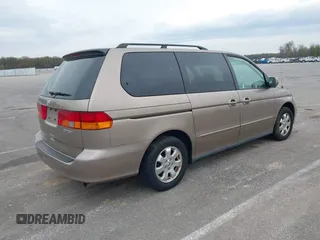 2004 Honda Odyssey EX-L with VIN 5FNRL18744B034830, listed as a IAAI auction lot 42052008 with 182,178 mi miles and . Bid and sale history available at DreamBid. Image 4.
