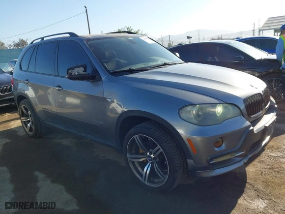 2009 BMW X5 30i with VIN 5UXFE43559L263332, listed as a IAAI auction lot 41998651 with 209,264 mi miles. Bid and sale history available at carsss.com. Image 1.