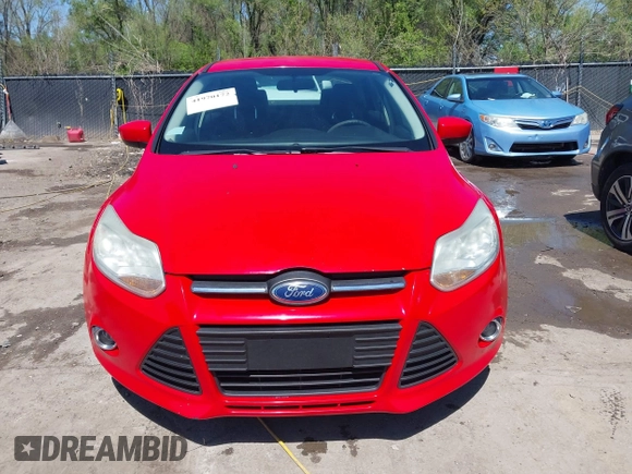 2012 Ford Focus SE z VIN 1FAHP3F23CL333598, wystawiony jako IAAI lot #41970172 z przebiegiem 209 969 mil mil oraz . Historia ofert i sprzedaży dostępna na DreamBid. Obrazek 13.