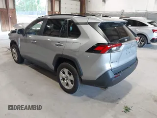 2021 Toyota RAV4 XLE with VIN 2T3P1RFV5MC180890, listed as a IAAI auction lot 42567858 with 56,961 mi miles and . Bid and sale history available at DreamBid. Image 3.
