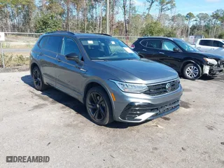 2023 Volkswagen Tiguan SE R-Line Black with VIN 3VVCB7AX7PM132001, listed as a IAAI auction lot 41042085 with 15,007 mi miles. Bid and sale history available at carsss.com. Image 1.