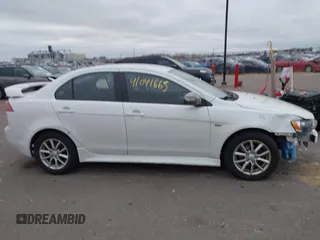 2016 Mitsubishi Lancer SE with VIN JA32V2FWXGU003619, listed as a IAAI auction lot 41041665 with 98,627 mi miles. Bid and sale history available at carsss.com. Image 13.