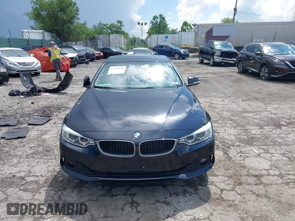 2015 BMW 4 Series 428i xDrive with VIN WBA4C9C52FD331620, listed as a IAAI auction lot 42556526 with 115,674 mi miles and . Bid and sale history available at DreamBid. Image 13.
