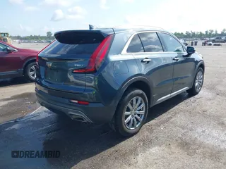 2021 Cadillac XT4 FWD Premium Luxury with VIN 1GYFZCR42MF007617, listed as a IAAI auction lot 42437974 with 126,071 mi miles and . Bid and sale history available at DreamBid. Image 4.