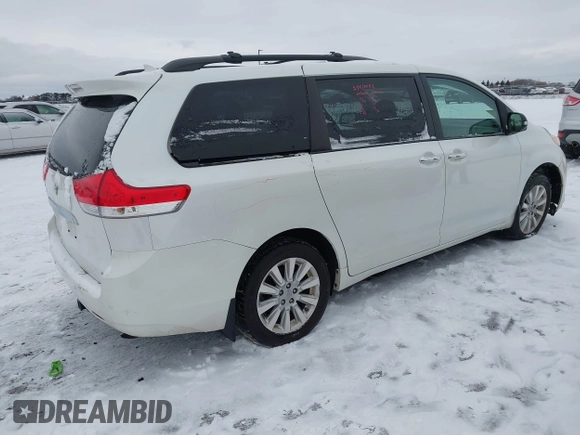 2013 Toyota Sienna XLE with VIN 5TDDK3DC2DS053559, listed as a IAAI auction lot 41299824 with 175,611 mi miles and . Bid and sale history available at DreamBid. Image 4.