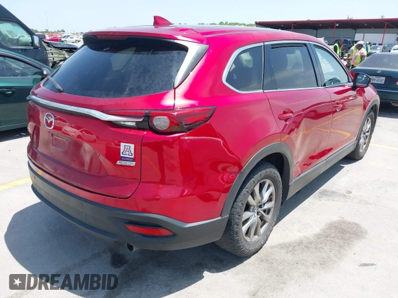 2018 Mazda CX-9 Touring with VIN JM3TCBCY6J0201556, listed as a IAAI auction lot 42285456 with 144,841 mi miles and . Bid and sale history available at DreamBid. Image 4.
