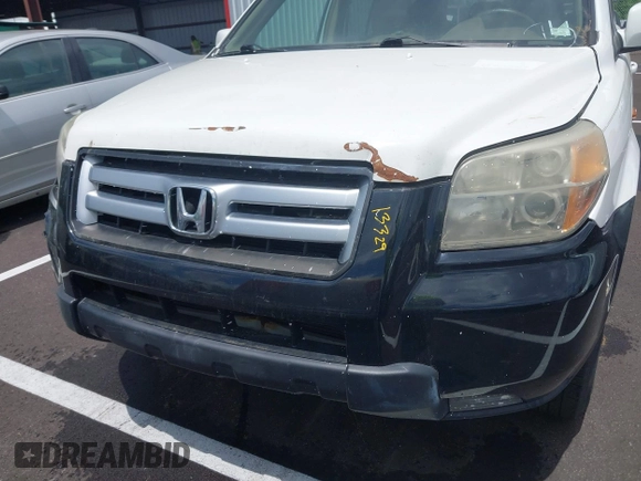 2007 Honda Pilot EX-L z VIN 5FNYF18627B024506, wystawiony jako IAAI lot #42220694 z przebiegiem 258 535 mil mil oraz . Historia ofert i sprzedaży dostępna na DreamBid. Obrazek 6.