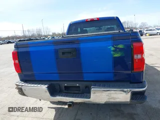 2014 Chevrolet Silverado 1500 LT with VIN 1GCVKREH7EZ324598, listed as a IAAI auction lot 41943170 with 127,204 mi miles and . Bid and sale history available at DreamBid. Image 16.