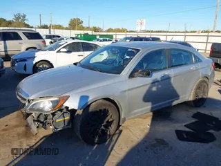 2012 Chrysler 200 S with VIN 1C3CCBHGXCN188538, listed as a IAAI auction lot 41085313 with 107,002 mi miles and . Bid and sale history available at DreamBid. Image 2.