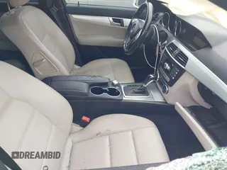 2014 Mercedes-Benz C-Class C 250 Sport with VIN WDDGF4HB9EA945465, listed as a IAAI auction lot 42035693 with 146,809 mi miles. Bid and sale history available at carsss.com. Image 5.