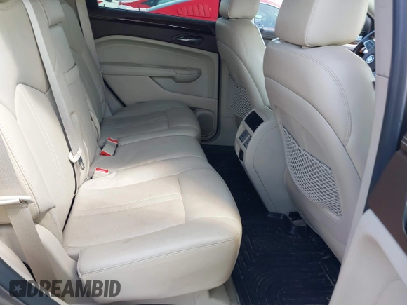 2011 Cadillac SRX Luxury Collection with VIN 3GYFNDEY6BS677576, listed as a IAAI auction lot 41769774 with 106,097 mi miles. Bid and sale history available at carsss.com. Image 8.
