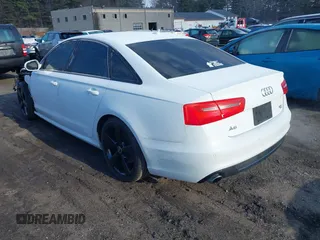 2014 Audi A6 Prestige with VIN WAUHGAFC8EN137457, listed as a IAAI auction lot 41854825 with 37,111 mi miles and . Bid and sale history available at DreamBid. Image 3.