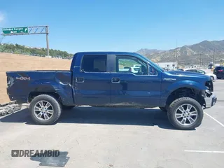 2014 Ford F-150 XL with VIN 1FTFW1EF1EKE11155, listed as a IAAI auction lot 42013793 with 245,476 mi miles and . Bid and sale history available at DreamBid. Image 14.