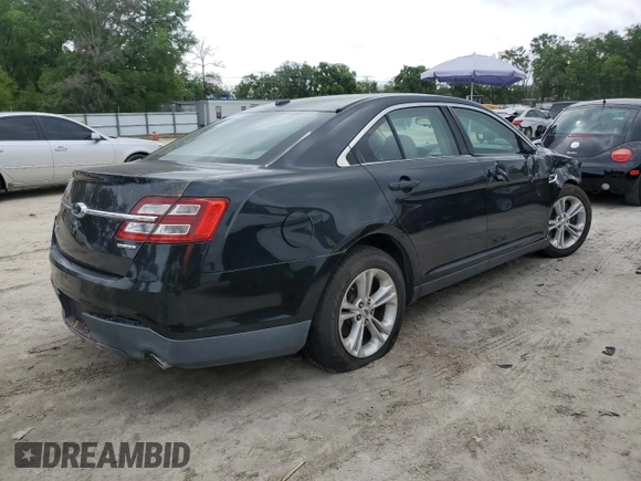 2015 Ford Taurus SE with VIN 1FAHP2D88FG136022, listed as a Copart auction lot 50944035 with 221,164 mi miles and Salvage Title. Bid and sale history available at DreamBid. Image 3.