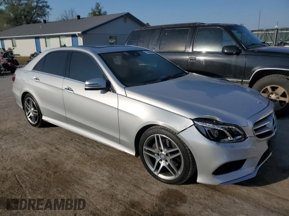 2015 Mercedes-Benz E 350 Luxury with VIN WDDHF8JB7FB134619, listed as a Copart auction lot 73518344 with 185,128 mi miles and Salvage title. Bid and sale history available at DreamBid. Image 4.
