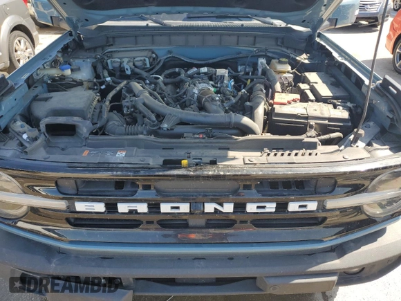 2022 Ford Bronco with VIN 1FMEE5DP3NLB62749, listed as a Copart auction lot 52227435 with 59,444 mi miles and Salvage Title. Bid and sale history available at DreamBid. Image 12.
