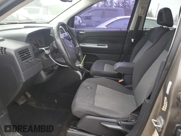2008 Jeep Compass Sport with VIN 1J8FT47WX8D566487, listed as a Copart auction lot 87428694 with 377,985 mi miles and Salvage Title. Bid and sale history available at carsss.com. Image 7.