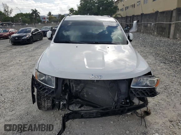 2016 Jeep Grand Cherokee Laredo z VIN 1C4RJEAG6GC390768, wystawiony jako Copart lot #51459885 z przebiegiem 130 690 mil mil oraz Szkoda całkowita • Salvage title. Historia ofert i sprzedaży dostępna na DreamBid. Obrazek 5.