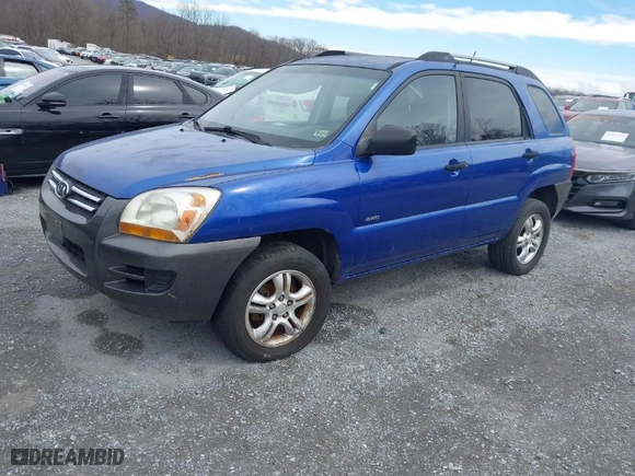 2008 Kia Sportage LX with VIN KNDJE723487477667, listed as a IAAI auction lot 41881032 with 225,840 mi miles. Bid and sale history available at carsss.com. Image 2.