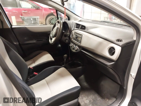 2012 Toyota Yaris L with VIN JTDKTUD34CD523773, listed as a IAAI auction lot 41616220 with 77,332 mi miles. Bid and sale history available at carsss.com. Image 5.