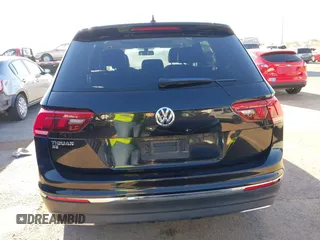 2021 Volkswagen Tiguan SE z VIN 3VV3B7AX0MM080853, wystawiony jako IAAI lot #42406539 z przebiegiem 73 295 mil mil oraz . Historia ofert i sprzedaży dostępna na DreamBid. Obrazek 17.