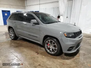 2021 Jeep Grand Cherokee SRT with VIN 1C4RJFDJ5MC667774, listed as a Copart auction lot 42484435 with 43,387 mi miles and Salvage Title. Bid and sale history available at carsss.com. Image 4.