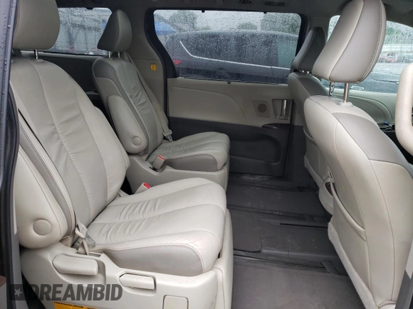 2011 Toyota Sienna XLE z VIN 5TDDK3DC6BS014552, wystawiony jako Copart lot #58292205 z przebiegiem 95 898 mil mil oraz Czysty tytuł • Clean title. Historia ofert i sprzedaży dostępna na DreamBid. Obrazek 11.