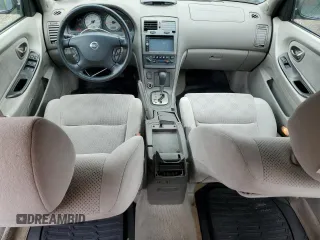 2003 Nissan Maxima SE z VIN JN1DA31D43T502355, wystawiony jako Copart lot #57233745 z przebiegiem 161 005 mil mil oraz Szkoda całkowita • Salvage title. Historia ofert i sprzedaży dostępna na DreamBid. Obrazek 8.