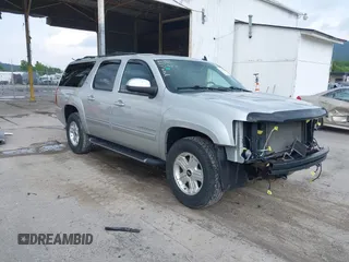 2011 Chevrolet Suburban LT z VIN 1GNSKJE32BR330742, wystawiony jako IAAI lot #42435335 z przebiegiem 191 663 mil mil oraz . Historia ofert i sprzedaży dostępna na DreamBid. Obrazek 1.