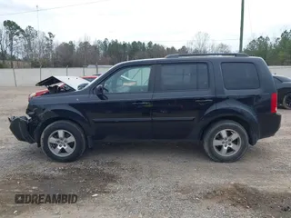2011 Honda Pilot EX-L with VIN 5FNYF3H6XBB030039, listed as a IAAI auction lot 41596617 with 116,961 mi miles and . Bid and sale history available at DreamBid. Image 14.