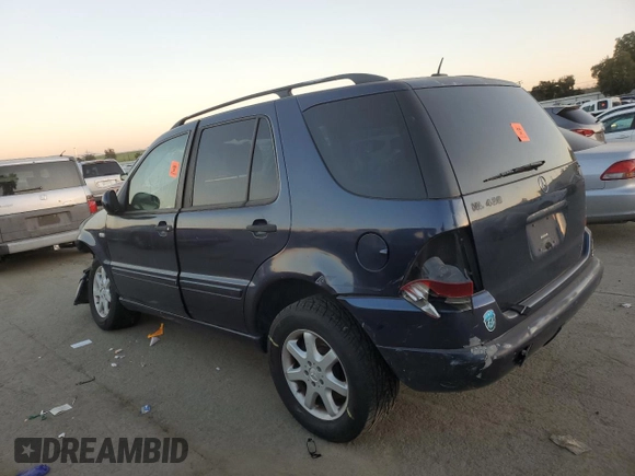2001 Mercedes-Benz M 320/430/500 z VIN 4JGAB72E91A260677, wystawiony jako Copart lot #89200235 z przebiegiem 180 414 mil mil oraz Szkoda całkowita • Salvage title. Historia ofert i sprzedaży dostępna na DreamBid. Obrazek 2.