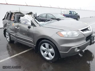 2008 Acura RDX with VIN 5J8TB18208A009825, listed as a IAAI auction lot 41206770 with 207,795 mi miles. Bid and sale history available at carsss.com. Image 1.