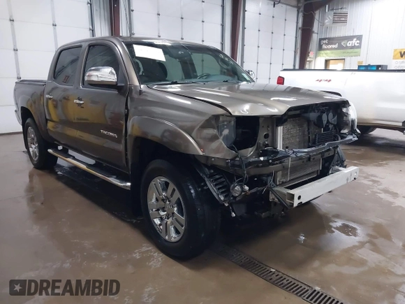 2014 Toyota Tacoma PreRunner with VIN 3TMJU4GNXEM164507, listed as a IAAI auction lot 42118984 with 183,101 mi miles and . Bid and sale history available at DreamBid. Image 1.