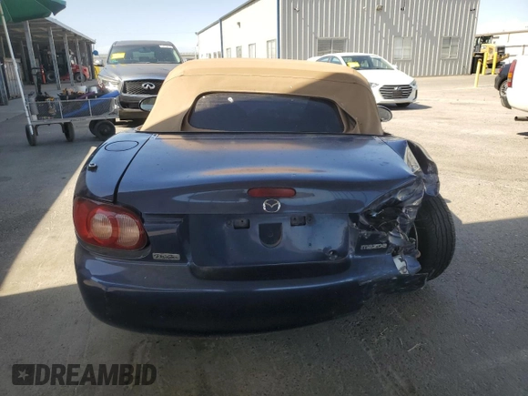 2002 Mazda MX-5 Miata Cloth z VIN JM1NB353220222868, wystawiony jako Copart lot #59944345 z przebiegiem 159 595 mil mil oraz Szkoda całkowita • Salvage title. Historia ofert i sprzedaży dostępna na DreamBid. Obrazek 10.