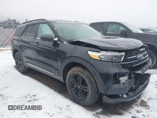 2021 Ford Explorer XLT with VIN 1FMSK8DH0MGA59737, listed as a IAAI auction lot 41474554 with 74,536 mi miles. Bid and sale history available at carsss.com. Image 1.
