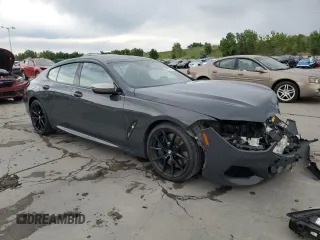 2020 BMW 8 Series M850i with VIN WBAGV8C0XLCD64228, listed as a Copart auction lot 60908315 with 67,643 mi miles and Salvage title. Bid and sale history available at DreamBid. Image 4.