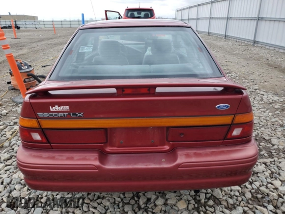 1996 Ford Escort z VIN 3FASP11J6TR151727, wystawiony jako Copart lot #55487725 z przebiegiem 118 276 mil mil oraz Nie do naprawy. Historia ofert i sprzedaży dostępna na DreamBid. Obrazek 6.
