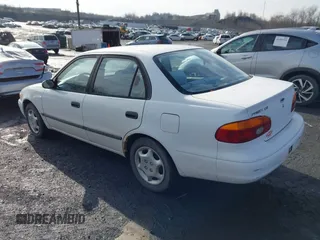 2001 Chevrolet Prizm z VIN 1Y1SK52871Z432340, wystawiony jako IAAI lot #41465388 z przebiegiem 122 272 mil mil oraz . Historia ofert i sprzedaży dostępna na DreamBid. Obrazek 3.